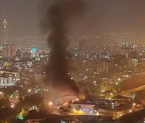 Tehran's notorious Evin Prison with fires burning inside the sprawling complex on October 15, 2022