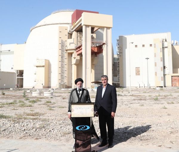 Iranian President Ebrahim Raisi (left) and head of Iran's Atomic Organization Mohammad Eslami during a visit to Bushehr nuclear power plant, in the city of Bushehr, southern Iran  (October 8, 2021)