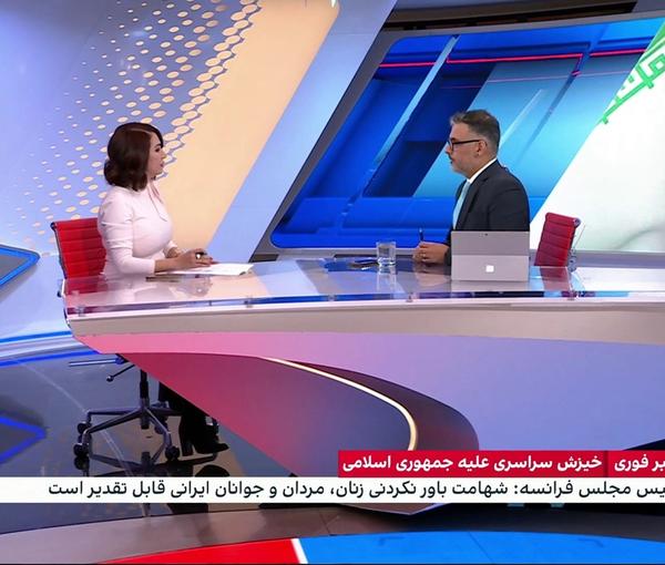 Iran International TV hosts during a program