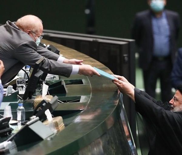 President Ebrahim Raisi submitting the administration’s draft of the national budget bill for the next Iranian calendar year 1401, which started on March 21, 2022