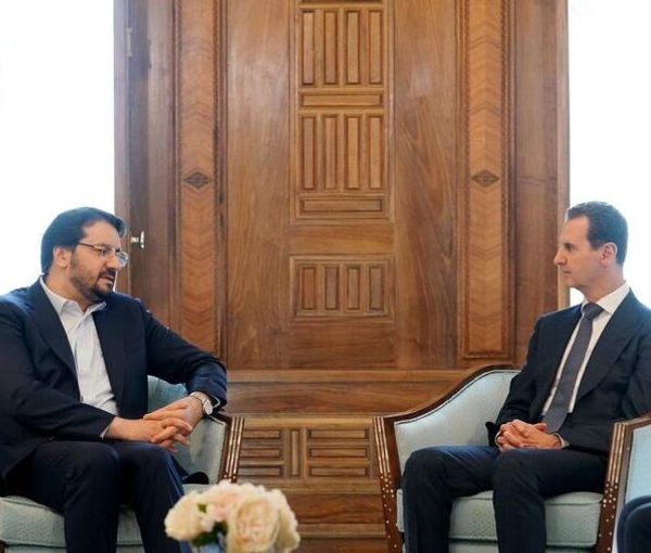Iran’s Minister of Transport and Urban Development Mehrdad Bazrpash during a meeting with Syrian President Bashar al-Assad in Damascus on April 27, 2023