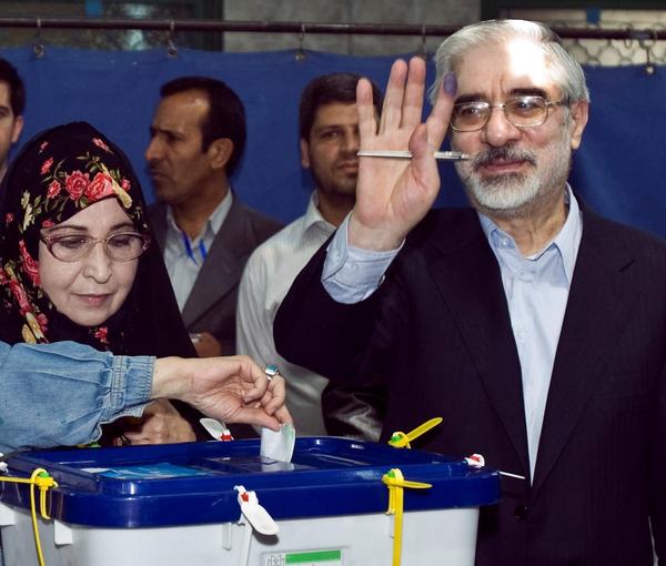 Mir-Hossein Mousavi with his wife Zahra Rahnavard casting his ballot in the 2009 disputed presidential election