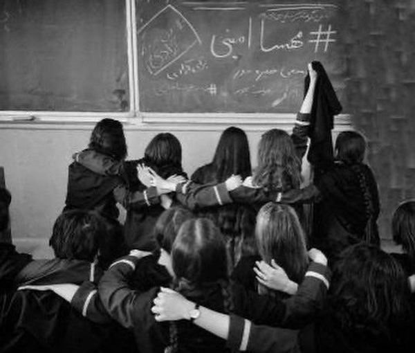 Schoolgirls protesting in class by removing their hijab. October 3, 2022