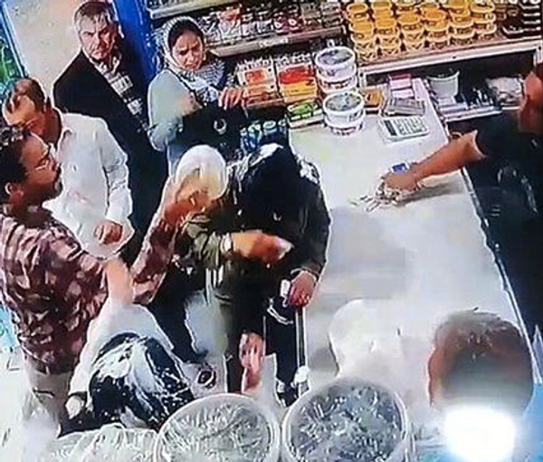 A screengrab from the CCTV camera of the shop where women were attacked in the city of Shandiz