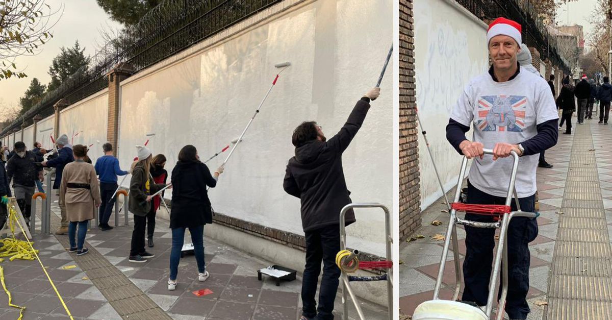 Volunteers In Iran Wipe Anti-UK Slogans Off Embassy Walls