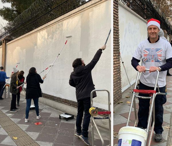 UK ambassador in Tehran  Simon Shercliff seen painting over embassy walls with Iranian helping out