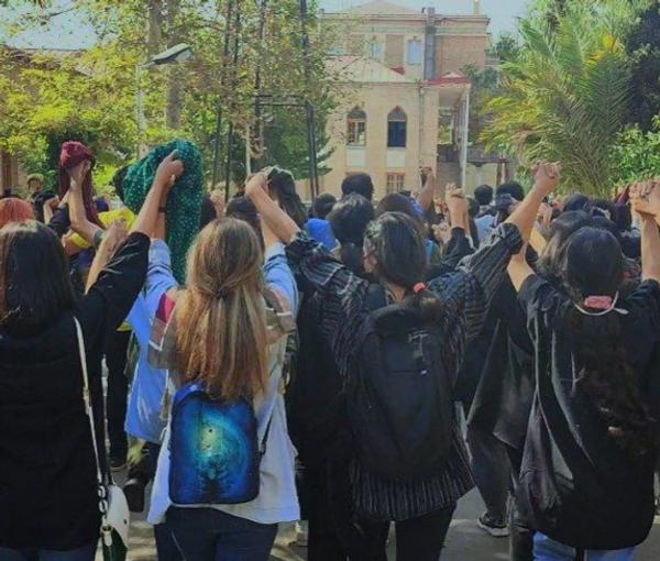 Students of the Art Faculty of University of Tehran unveiled at the campus to protest against mandatory hijab on October 18, 2022. 