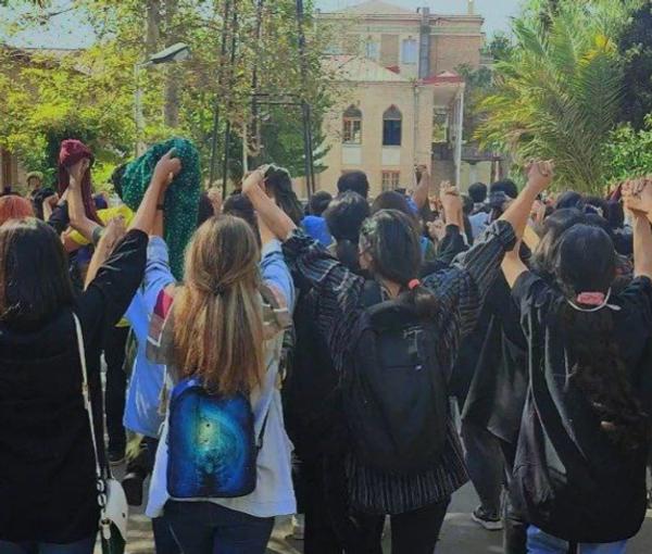 Students of the Art Faculty of University of Tehran unveiled at the campus to protest against mandatory hijab on October 18, 2022.
