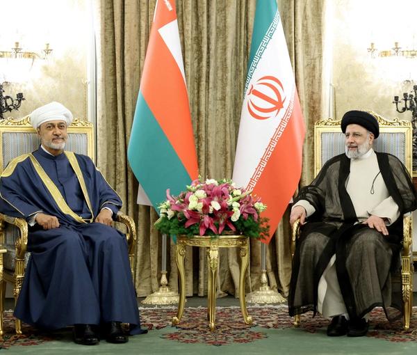 Iranian President Ebrahim Raisi (right) and Oman’s Sultan Haitham bin Tariq Al Said meet in Tehran on May 28, 2023.