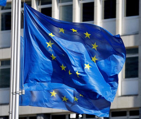 European Union flags fly outside the European Commission headquarters in Brussels, Belgium, March 1, 2023.