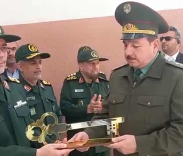 Chief of staff of the Islamic Republic's armed forces Major General Mohammad Baqeri (L) handing a symbolic key to Tajik defense minister Colonel General Sherali Mirzo during the opening ceremony of a drone manufacturing plant in Tajikistan’s capital Dushanbe (May 17, 2022)