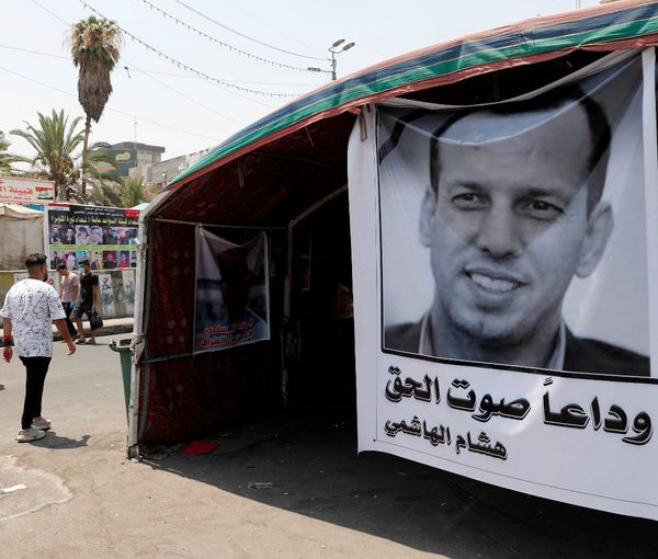 A poster depicting the former government advisor and political analyst Hisham al-Hashemi, who was killed by gunmen is seen at the Tahrir Square in Baghdad, Iraq July 8, 2020 (file photo)