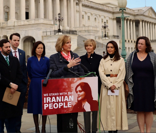 The cover of the report by US lawmaker Claudia Tenney (Rep-NY), showing her delivering a speech about the “Women, Life, Liberty” movement in Iran (undated)