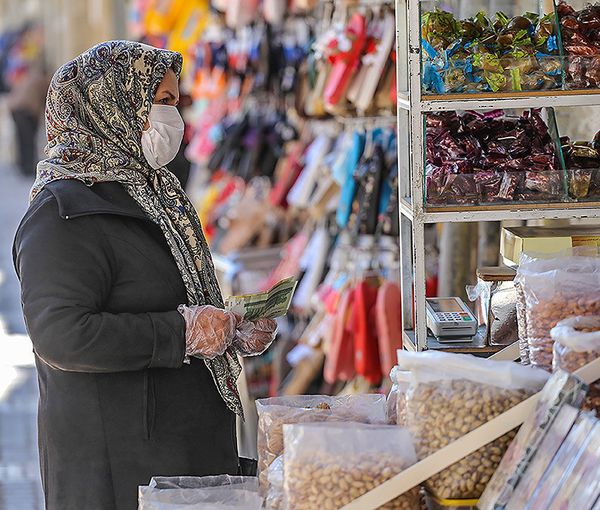 A woman shopping in Tehran. Undated