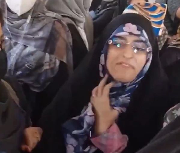 Frame grab show the woman enforcing hijab and threatening anti-hijab protesters in a city bus in Tehran on July 16.