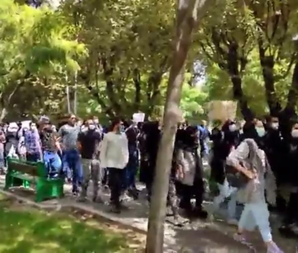 Screen grab from a video showing university students protesting in Tehran. Sept. 26, 2022