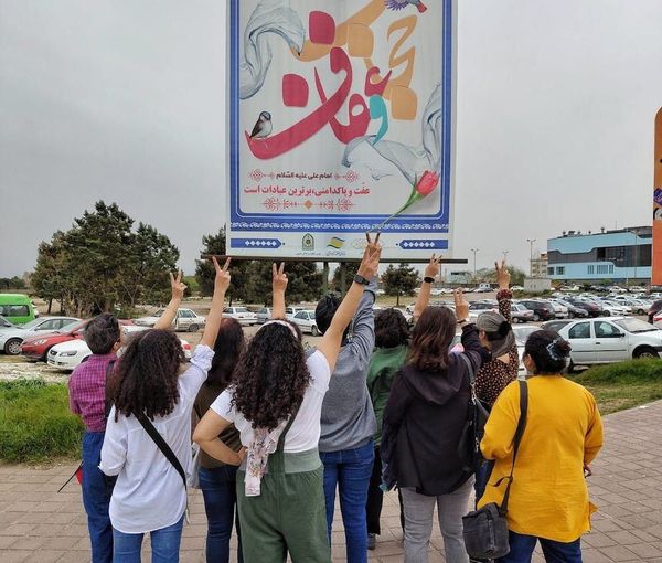 A group of Iranian women unveiling in public in defiance of mandatory hijab   (August 2023)