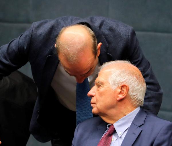 EU foreign policy chief Josep Borrell speaking with his top aide Enrique Mora during his meeting with Iran's foreign minister Amir-Abdollahian in Jordan on December 20, 2022