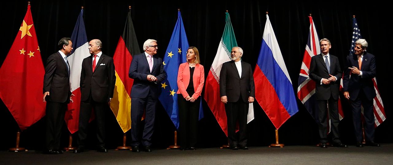 Officials announcing Iran nuclear agreement in Vienna in July 2015. (From left to right) Foreign ministers/secretaries of state Wang Yi (China), Laurent Fabius (France), Frank-Walter Steinmeier (Germany), Federica Mogherini (EU), Mohammad Javad Zarif (Iran), Philip Hammond (UK), John Kerry (USA)  