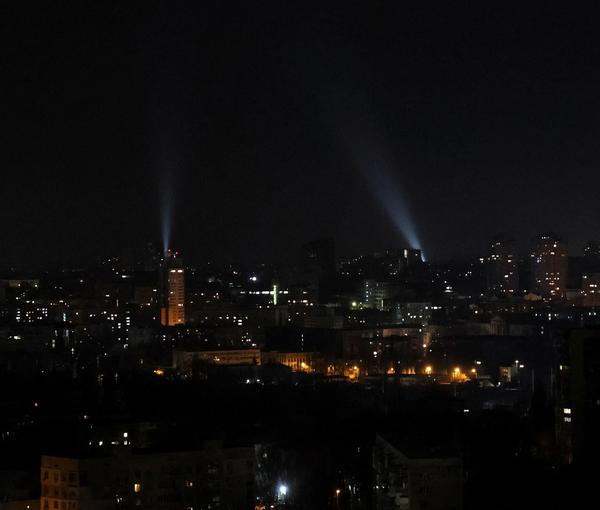 Ukrainian servicemen use searchlights as they search for drones in a sky over city during a Russian drones strike, amid Russia's attack on Ukraine, in Kyiv, January 1, 2023.