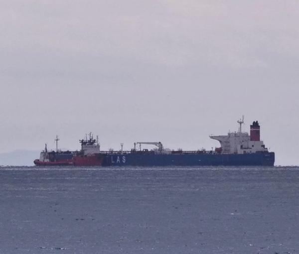 The seized Russian-flagged oil tanker Pegas is seen anchored off the shore of Karystos, on the Island of Evia, Greece, April 19, 2022.