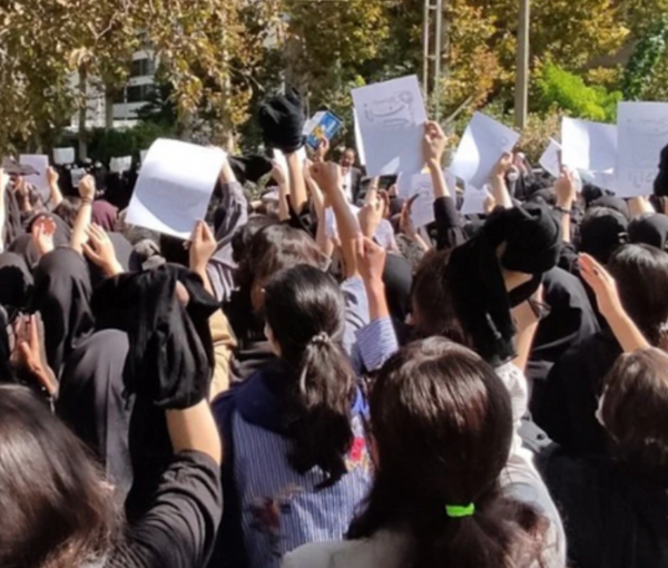 A group of university students unveiling in protest to mandatory hijab (file photo)