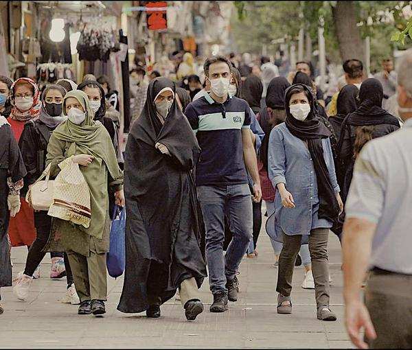People on street in Tehran (file photo)