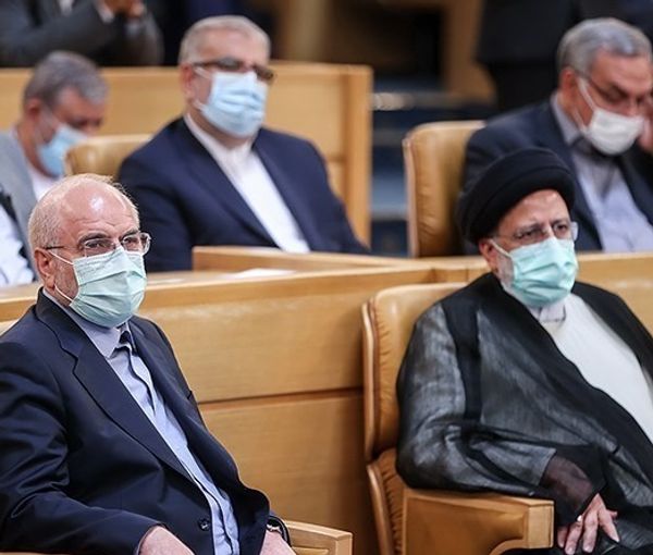 Parliament Speaker Ghaibaf (L) and President Raisi on April 2, 2022