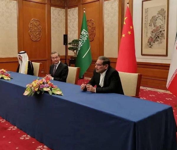 Former Secretary of Iran’s Supreme National Security Council, Ali Shamkhani (R) with China's Wang Yi and Saudi Arabia's Musaad bin Mohammed Al Aiban in Beijing on March 10, 2023