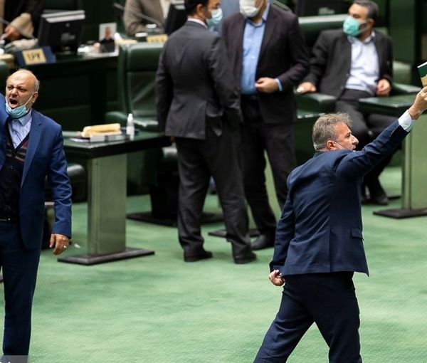 Members of Iran's parliament shouting on the floor. October 17, 2021