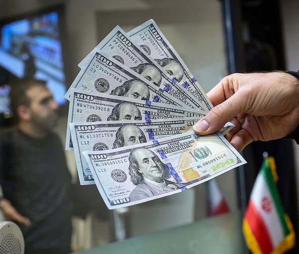 A foreign currency exchange business in Tehran. Undated