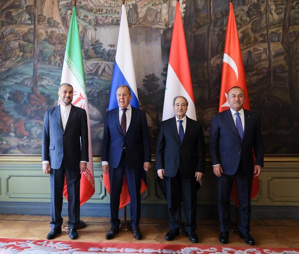 Foreign ministers Hossein Amirabdollahian of Iran, Sergei Lavrov of Russia, Faisal Mekdad of Syria and Mevlut Cavusoglu of Turkey pose for a picture during a meeting in Moscow, Russia, May 10, 2023.