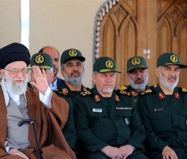 Supreme Leader Ali Khamenei (left) and a number of senior members of the Revolutionary Guard  (undated)