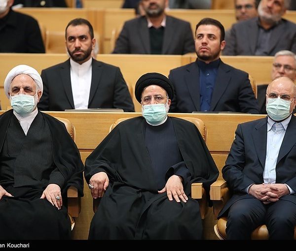 Iran’s President Ebrahim Raisi (center), Parliament Speaker Mohammad-Bagher Ghalibaf (right), and Chief Justice Gholam-Hossein Mohseni-Ejei during a meeting in December, 2022 