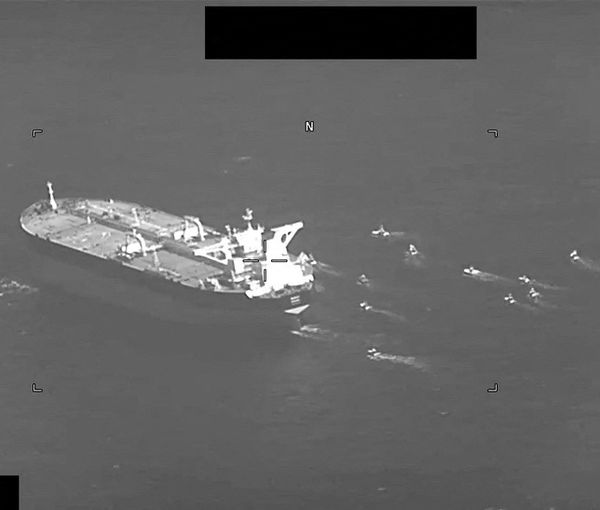 Fast-attack crafts from IRGC Navy swarming oil tanker Niovi as it transits the Strait of Hormuz, May 3, 2023