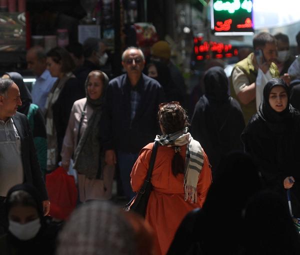 An Iranian woman walking unveiled in Tehran (undated)