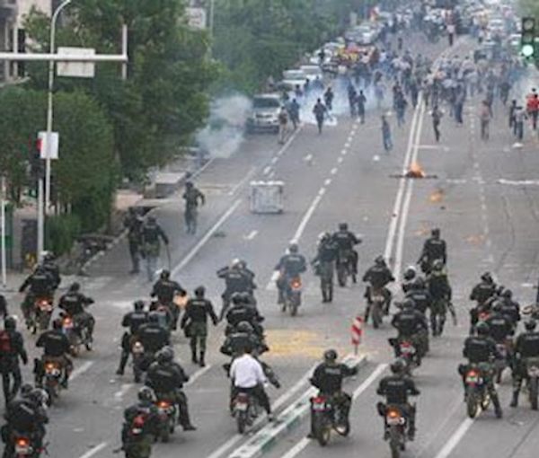 Riot police against protesters in Tehran during 2019 protests