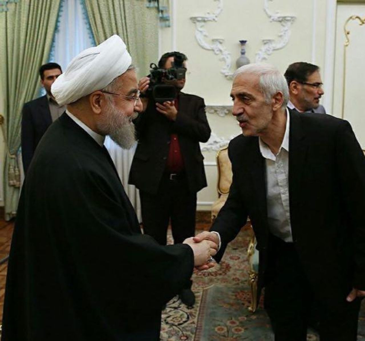 Former President of Iran&acirc;s Football Federation Mohammad Dadkan and former president Hassan Rouhani  
