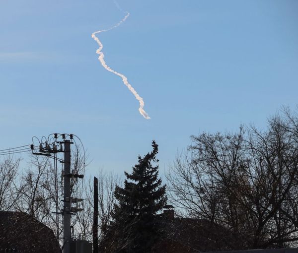 A missile trace is seen in a sky, as Russia's attack on Ukraine continues, near Kyiv, Ukraine February 15, 2023. 