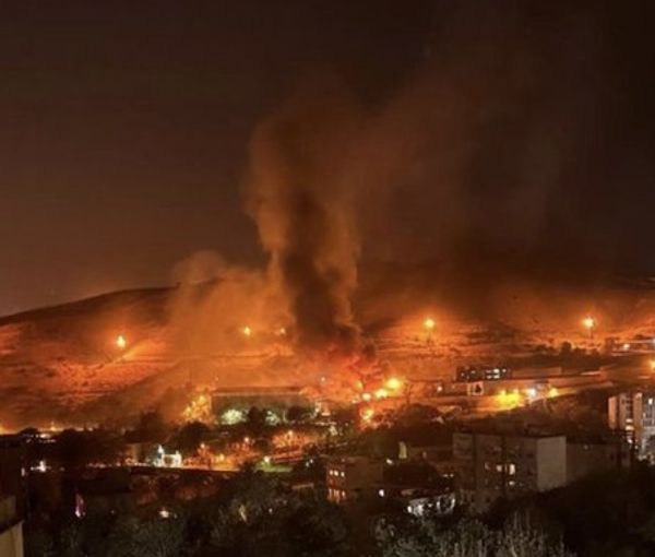Tehran's notorious Evin Prison with fires burning inside the sprawling complex on October 15, 2022