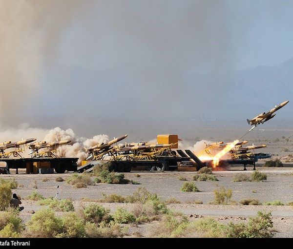 An Iranian drone flies during a military exercise in an undisclosed location in Iran. (August 25, 2022)