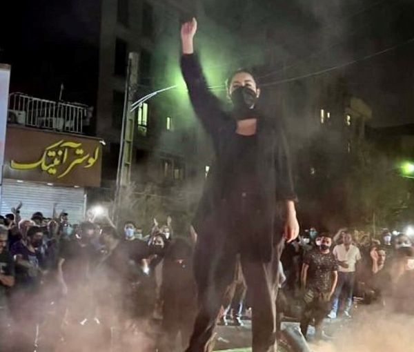 A scene from night time protests in Tehran in September