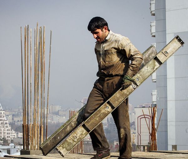 An Iranian worker in the capital Tehran  (file photo)