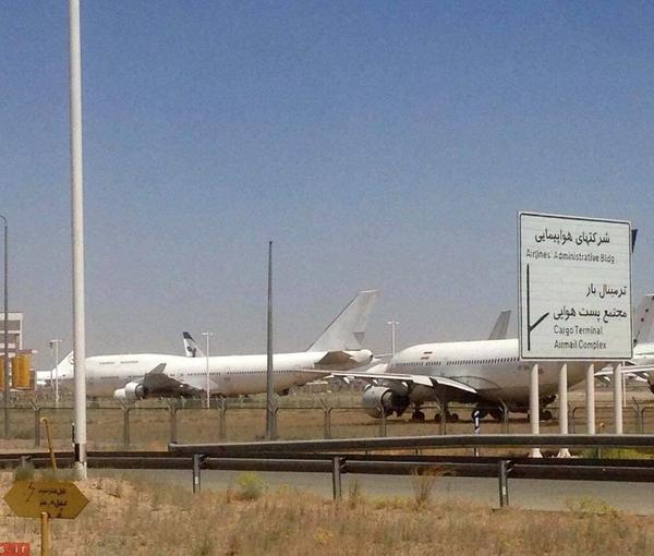 Iranian airliners idle on tarmac in Tehran. Undated