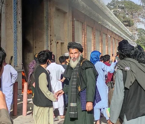 Afghan protesters set fire to the entrance of Iran's consulate in Herat. April 11, 2022