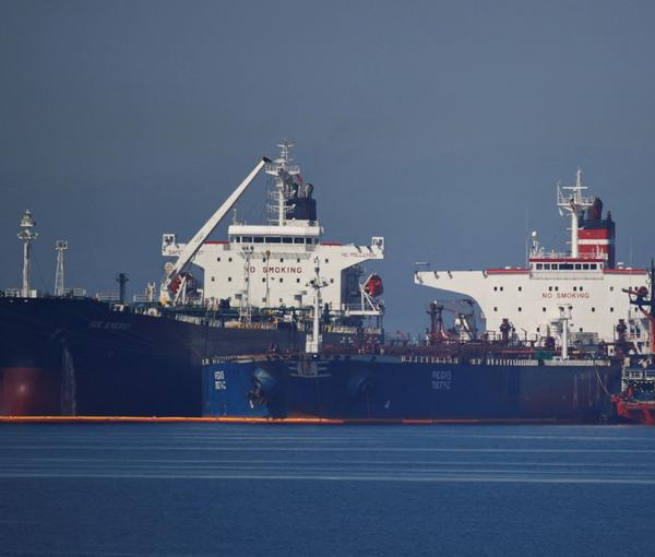 The Liberian-flagged oil tanker Ice Energy transfers crude oil from the Iranian-flagged oil tanker Lana (former Pegas), off the shore of Karystos, on the Island of Evia, Greece, May 26, 2022.