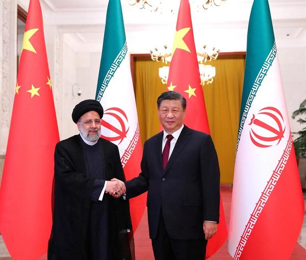  Iranian President Ebrahim Raisi shakes hands with Chinese President Xi Jinping during a welcoming ceremony in Beijing, China, February 14, 2023.