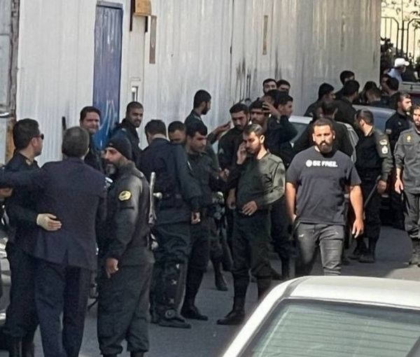 A group of security forces waiting on a side street to confront protesters in a university in Iran October 3, 2022