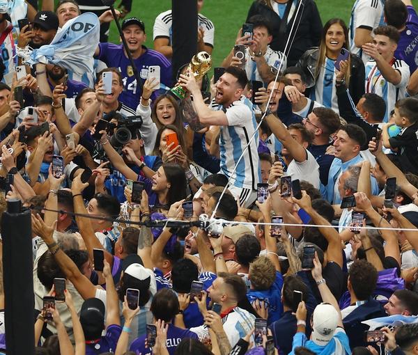 Argentinian football super-star Messi celebrating after winning the World Cup. December 18, 2022