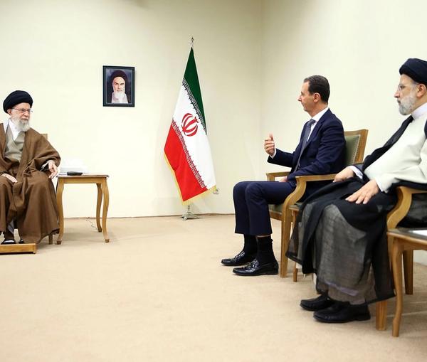 Supreme Leader Ali Khamenei (left), Syrian President Bashar al-Assad (center) and Iranian President Ebrahim Raisi during a meeting in Tehran on May 8, 2022